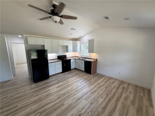 405 S Walnut St, Marshall, AR 72650 - kitchen featuring ceiling fan, a sink, light wood-style flooring, visible vents, and black appliances