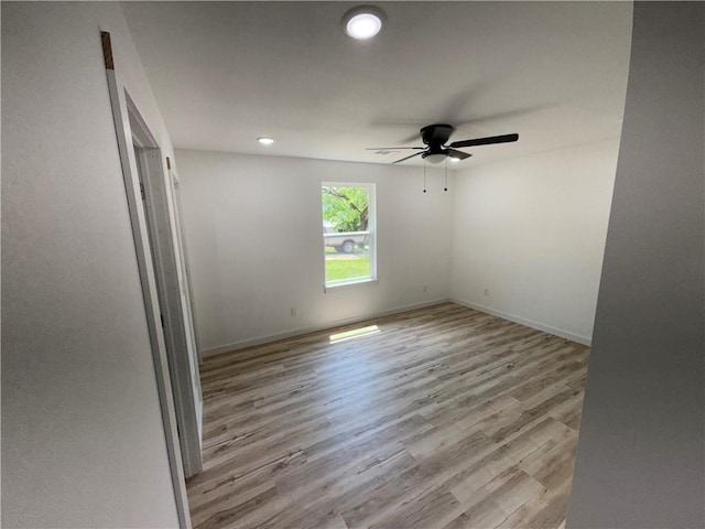 405 S Walnut St, Marshall, AR 72650 - empty room featuring recessed lighting, a ceiling fan, baseboards, and wood finished floors