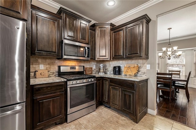 4502 SW Alfalfa Ave, Bentonville, AR 72713 - kitchen with stainless steel appliances, ornamental molding, tasteful backsplash, dark brown cabinets, and a chandelier