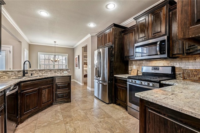 4502 SW Alfalfa Ave, Bentonville, AR 72713 - kitchen featuring appliances with stainless steel finishes, a chandelier, ornamental molding, decorative backsplash, and light stone countertops
