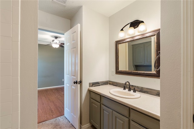 503 Oakwood St, Lowell, AR 72745 - bathroom featuring vanity and a ceiling fan