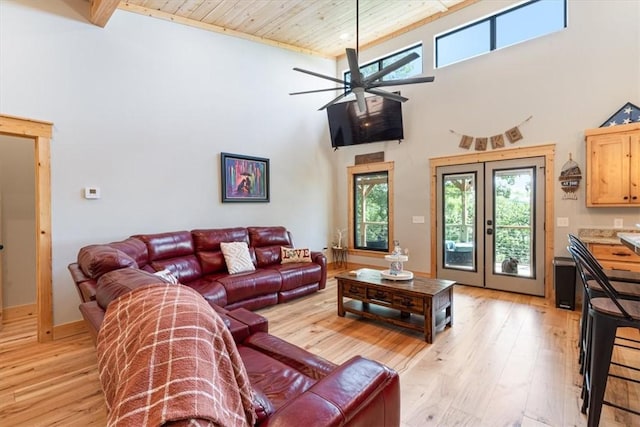 13936 Deepwater Dr, Garfield, AR 72732 - living room featuring a ceiling fan, a healthy amount of sunlight, light wood-style flooring, and wood ceiling