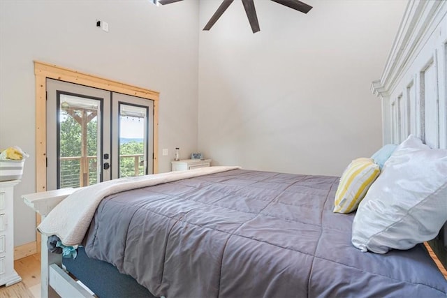 13936 Deepwater Dr, Garfield, AR 72732 - bedroom with ceiling fan, french doors, a towering ceiling, wood finished floors, and access to outside