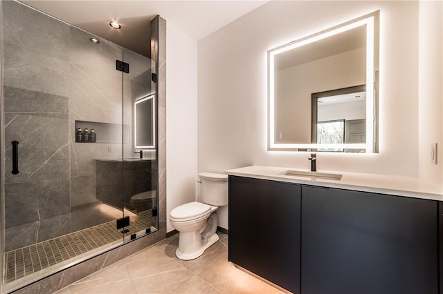 1104 N Fillmore St, Bentonville, AR 72712 - full bath with a stall shower, vanity, tile patterned flooring, and toilet