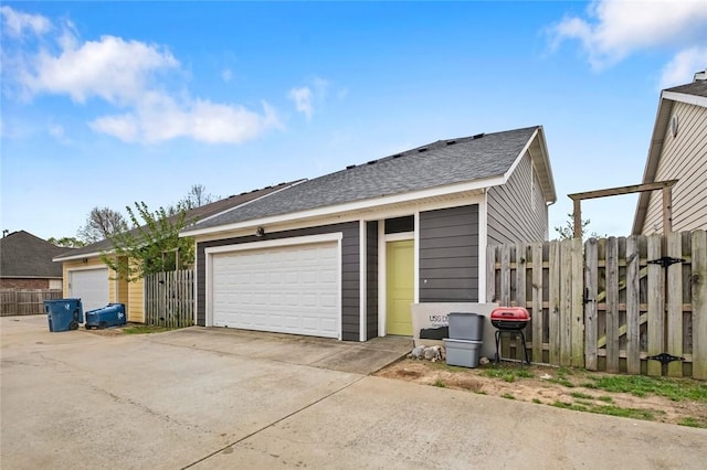 garage with fence