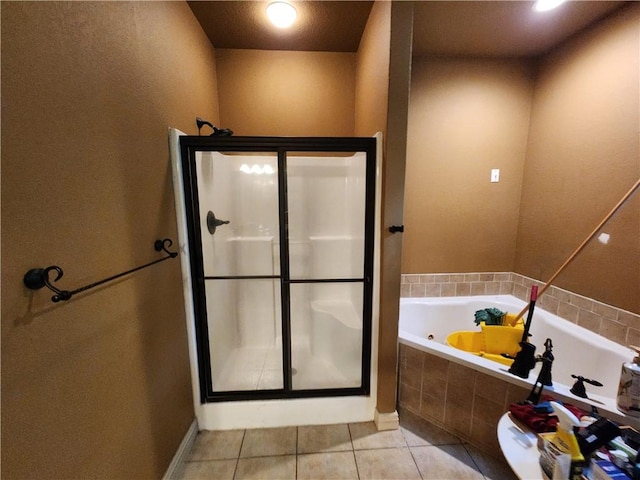 1 Binham Ln, Bella Vista, AR 72715 - full bathroom featuring a shower stall, a jetted tub, and tile patterned flooring
