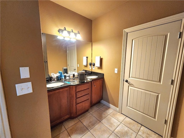 1 Binham Ln, Bella Vista, AR 72715 - full bathroom featuring tile patterned floors, double vanity, and baseboards