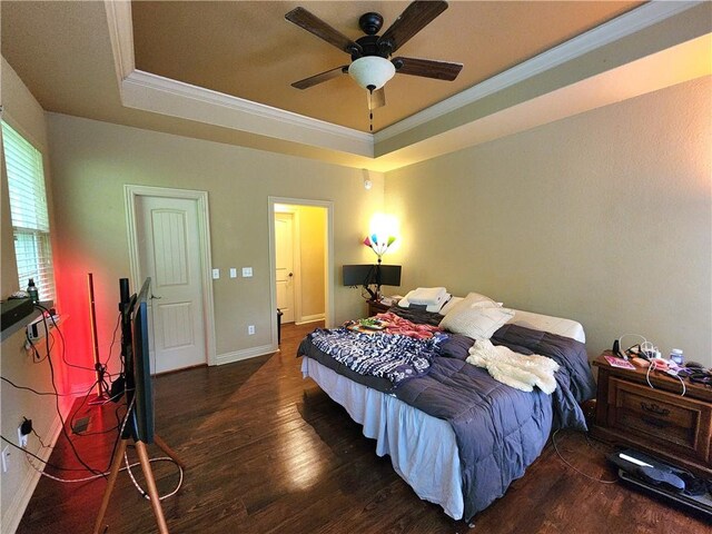 1 Binham Ln, Bella Vista, AR 72715 - bedroom featuring a tray ceiling, wood finished floors, ornamental molding, baseboards, and ceiling fan