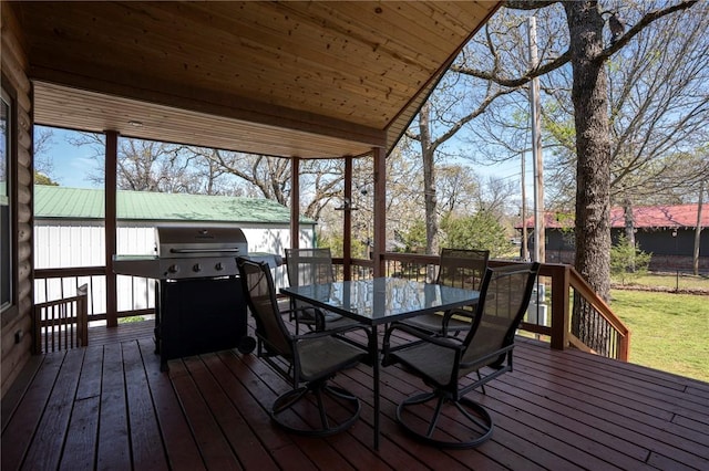 95951 Manns Dr, Gore, OK 74435 - wooden terrace featuring outdoor dining area and a grill