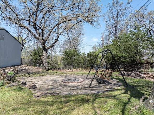 95951 Manns Dr, Gore, OK 74435 - view of yard featuring fence and a fire pit
