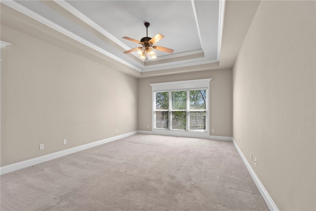 3902 NE Cadbury Ave, Bentonville, AR 72712 - carpeted empty room with a tray ceiling, a ceiling fan, baseboards, and crown molding