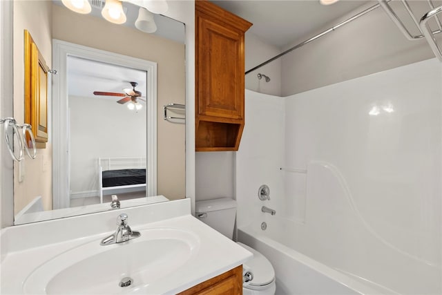 3902 NE Cadbury Ave, Bentonville, AR 72712 - bathroom with toilet, vanity, shower / bathtub combination, and a ceiling fan