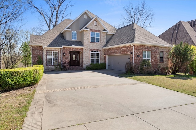 3902 NE Cadbury Ave, Bentonville, AR 72712 - view of front of property with brick siding, concrete driveway, a garage, and a shingled roof