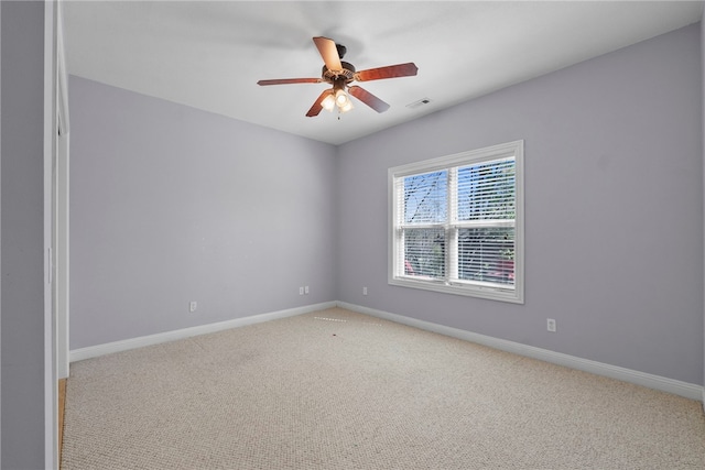 3902 NE Cadbury Ave, Bentonville, AR 72712 - unfurnished room with carpet flooring, a ceiling fan, and baseboards