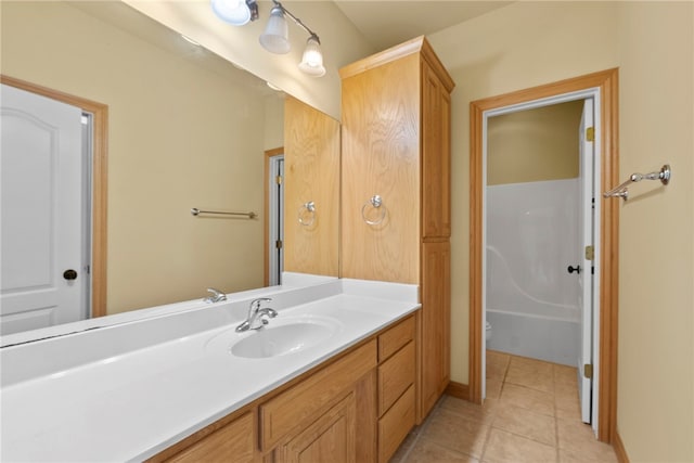 3902 NE Cadbury Ave, Bentonville, AR 72712 - bathroom featuring vanity, toilet, tile patterned floors, a tub, and a shower