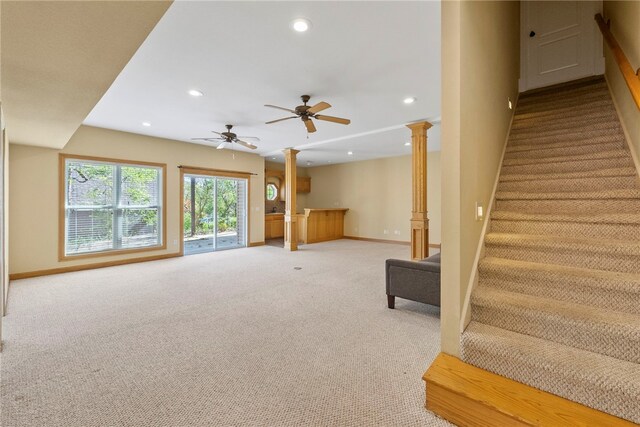3902 NE Cadbury Ave, Bentonville, AR 72712 - staircase with carpet floors, recessed lighting, baseboards, ornate columns, and ceiling fan