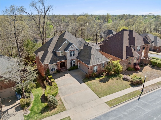 3902 NE Cadbury Ave, Bentonville, AR 72712 - view from above of property with a heavily wooded area