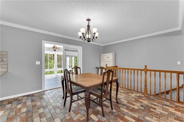 dining space featuring brick floors, crown molding, a chandelier, a textured ceiling, and baseboards