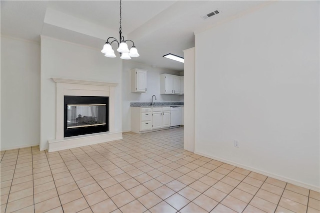 1762 Oxford Pl, Springdale, AR 72764 - unfurnished living room featuring a chandelier and a sink
