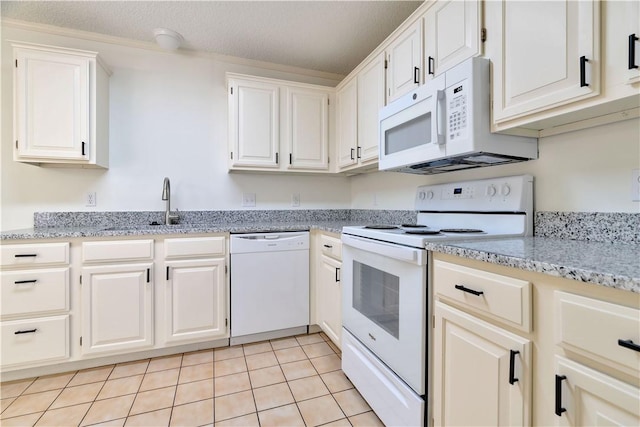 1762 Oxford Pl, Springdale, AR 72764 - kitchen with white appliances, a sink, light stone countertops, white cabinets, and a textured ceiling