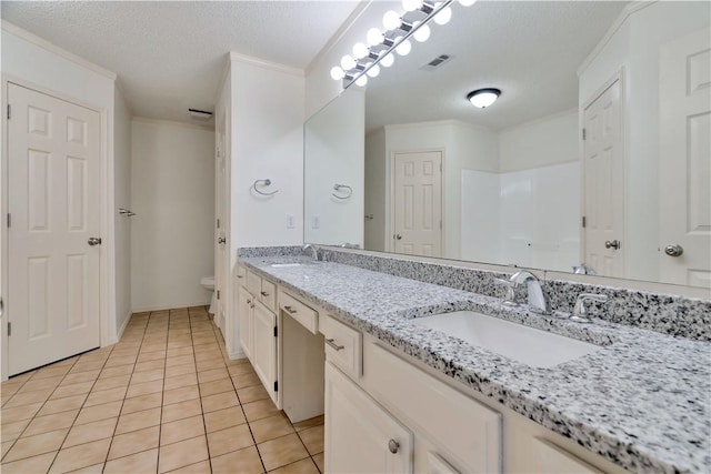 1762 Oxford Pl, Springdale, AR 72764 - full bath featuring toilet, tile patterned flooring, a textured ceiling, double vanity, and ornamental molding