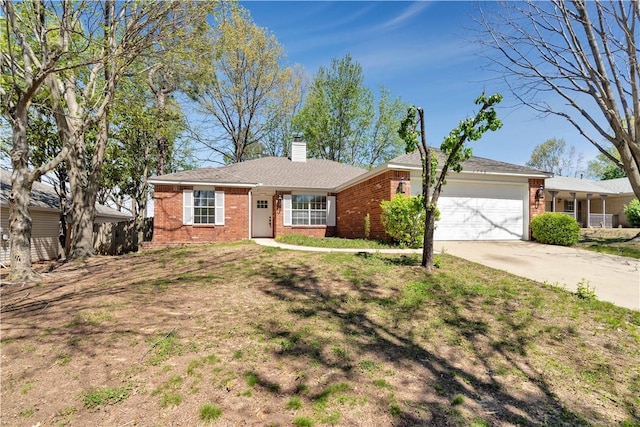 1740 Oxford Pl, Springdale, AR 72764 - ranch-style home featuring brick siding, an attached garage, a chimney, and concrete driveway