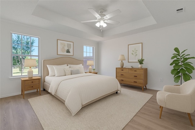 1740 Oxford Pl, Springdale, AR 72764 - bedroom with a tray ceiling, light wood-style floors, baseboards, and ceiling fan