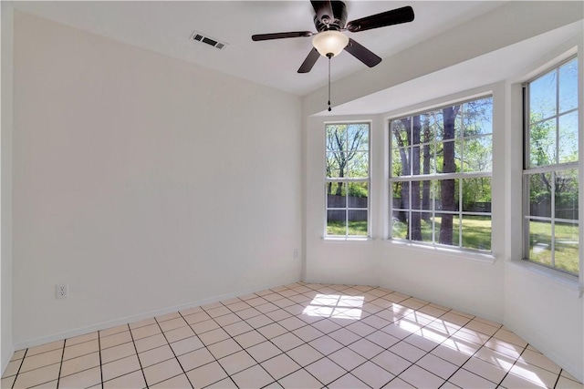 1765 Oxford Pl, Springdale, AR 72764 - empty room featuring ceiling fan and light tile patterned flooring