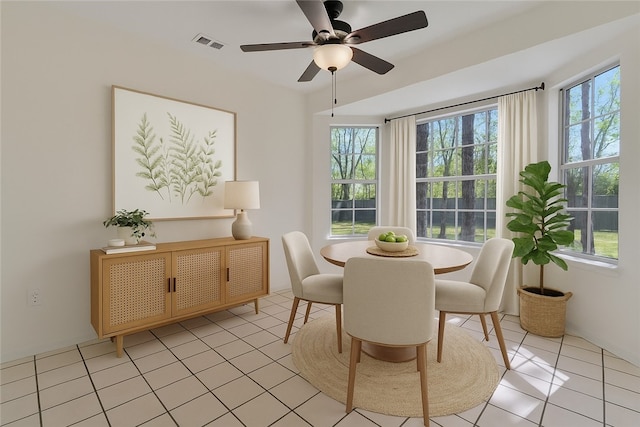 1765 Oxford Pl, Springdale, AR 72764 - dining room with light tile patterned floors and ceiling fan