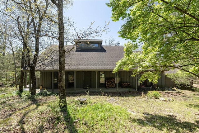 19584 Neills Bluff Rd, Springdale, AR 72764 - rear view of house with roof with shingles and board and batten siding