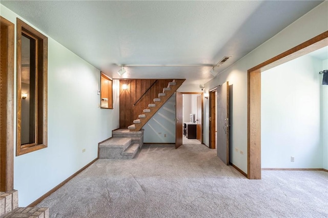 19584 Neills Bluff Rd, Springdale, AR 72764 - below grade area featuring baseboards, carpet flooring, and stairs