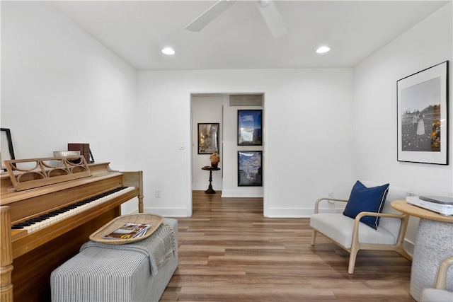 sitting room featuring recessed lighting, wood finished floors, a ceiling fan, and baseboards