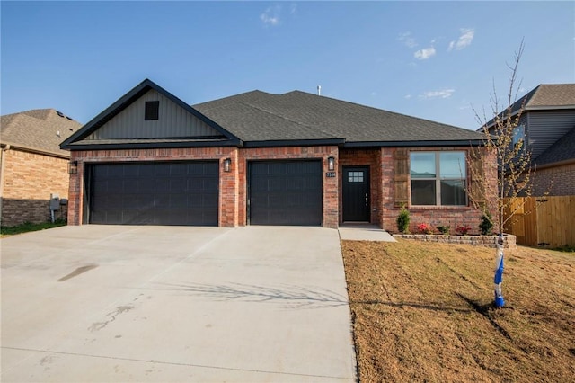 7104 SW High Meadow Blvd, Bentonville, AR 72713 - view of front facade with an attached garage, brick siding, concrete driveway, and a shingled roof