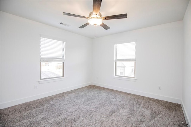 7104 SW High Meadow Blvd, Bentonville, AR 72713 - empty room featuring a ceiling fan, carpet flooring, and baseboards