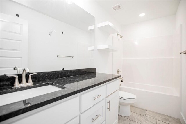 7104 SW High Meadow Blvd, Bentonville, AR 72713 - bathroom featuring toilet, vanity, shower / bathtub combination, and recessed lighting