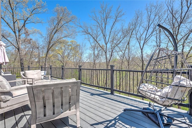 wooden deck with outdoor lounge area