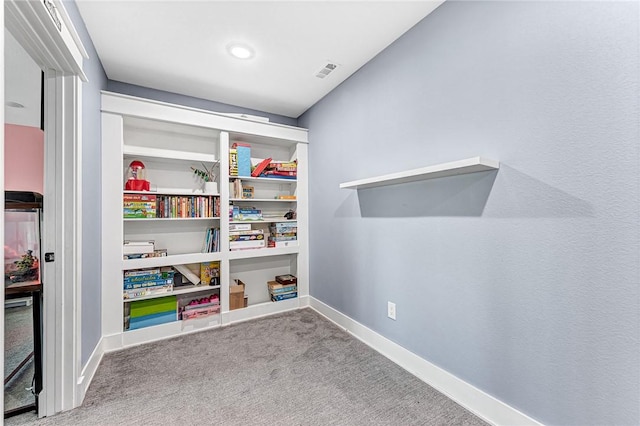 recreation room with baseboards, carpet flooring, and visible vents