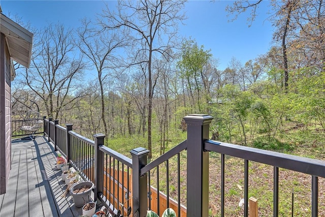 deck with a wooded view