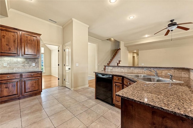 4004 SW Banbury Dr, Bentonville, AR 72713 - kitchen with black dishwasher, a sink, ceiling fan, light tile patterned floors, and decorative backsplash