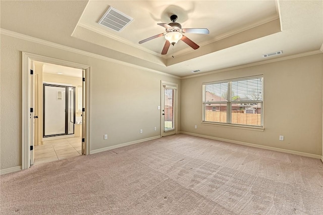 4004 SW Banbury Dr, Bentonville, AR 72713 - empty room with a tray ceiling, light colored carpet, ceiling fan, crown molding, and baseboards