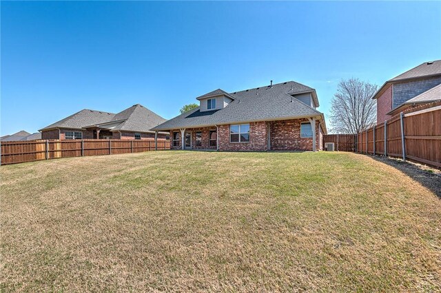 4004 SW Banbury Dr, Bentonville, AR 72713 - back of house featuring brick siding and roof with shingles