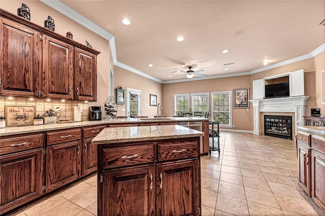 13708 Crazy Horse Dr, Rogers, AR 72758 - kitchen with recessed lighting, light tile patterned floors, a sink, a peninsula, and ceiling fan