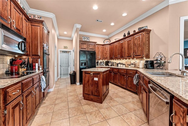 13708 Crazy Horse Dr, Rogers, AR 72758 - kitchen with a sink, light tile patterned flooring, decorative backsplash, light stone countertops, and black appliances