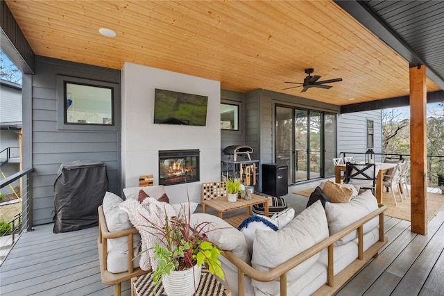 4 Shap Ln, Bella Vista, AR 72714 - wooden terrace with an outdoor living space with a fireplace, ceiling fan, and outdoor dining space
