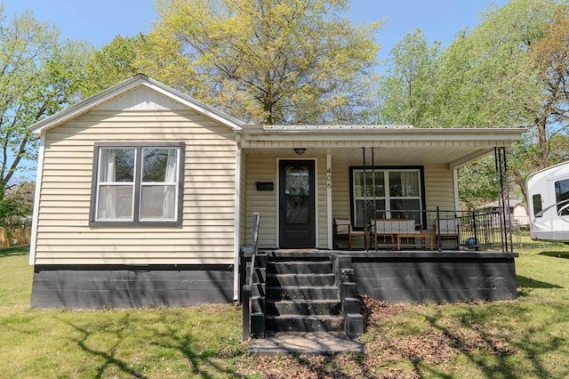 406 N Oak St, Harrison, AR 72601 - view of front of property featuring a porch and a front lawn