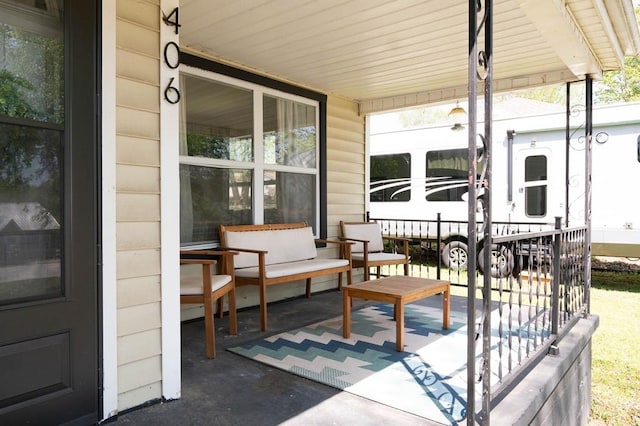 406 N Oak St, Harrison, AR 72601 - view of patio / terrace with a porch and a carport