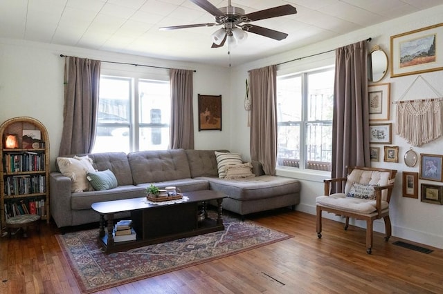 406 N Oak St, Harrison, AR 72601 - living room with hardwood / wood-style flooring, baseboards, a ceiling fan, and visible vents