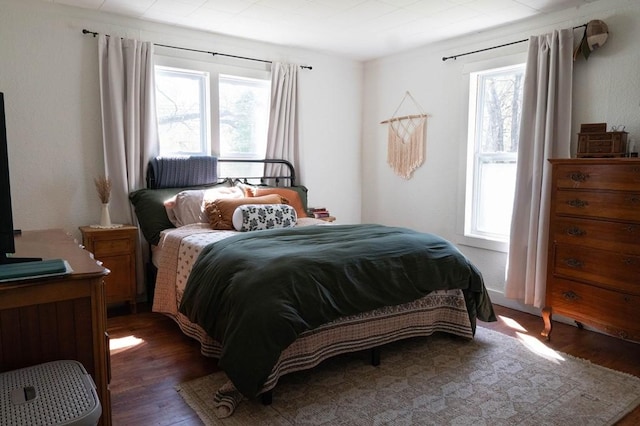 406 N Oak St, Harrison, AR 72601 - bedroom with wood finished floors and multiple windows
