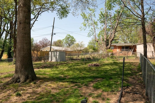 406 N Oak St, Harrison, AR 72601 - view of yard with a fenced backyard, an outdoor structure, and a storage shed