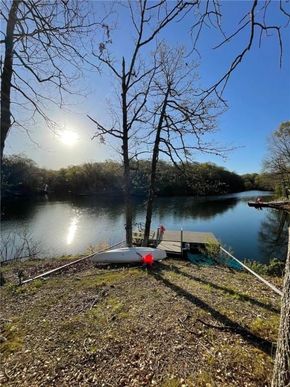 view of dock with a water view